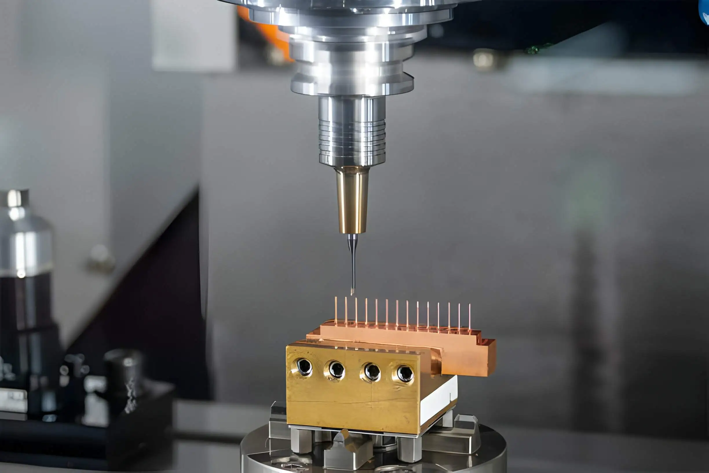 Capabilities-The hi-precision CNC milling machine cutting the copper electrode material