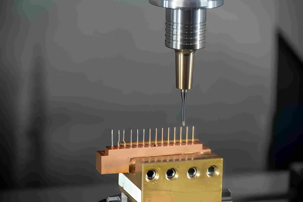The hi-precision CNC milling machine cutting the copper material