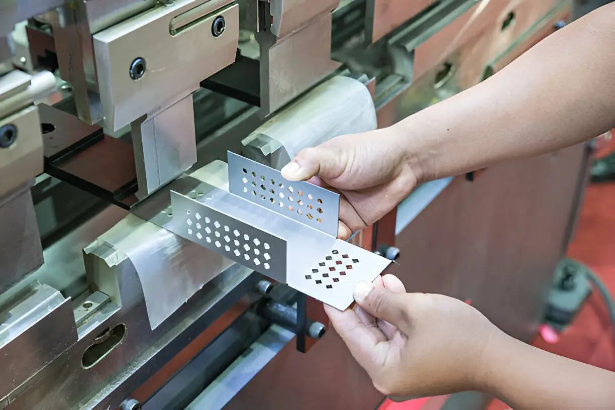 bending-Worker at manufacture workshop operating cidan folding machine