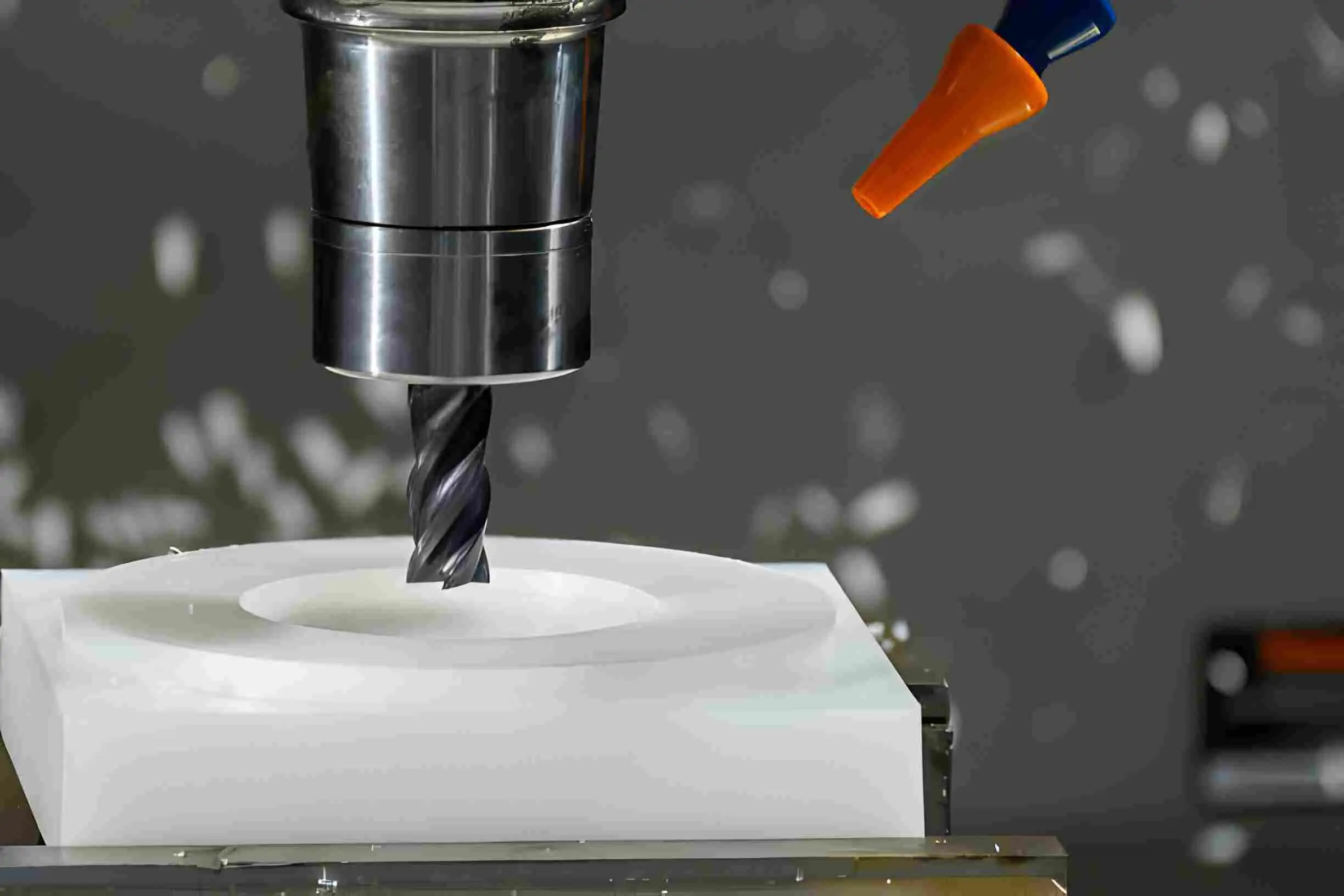 milling-The CNC milling machine cutting the nylon 6 material part with flat end mill tool