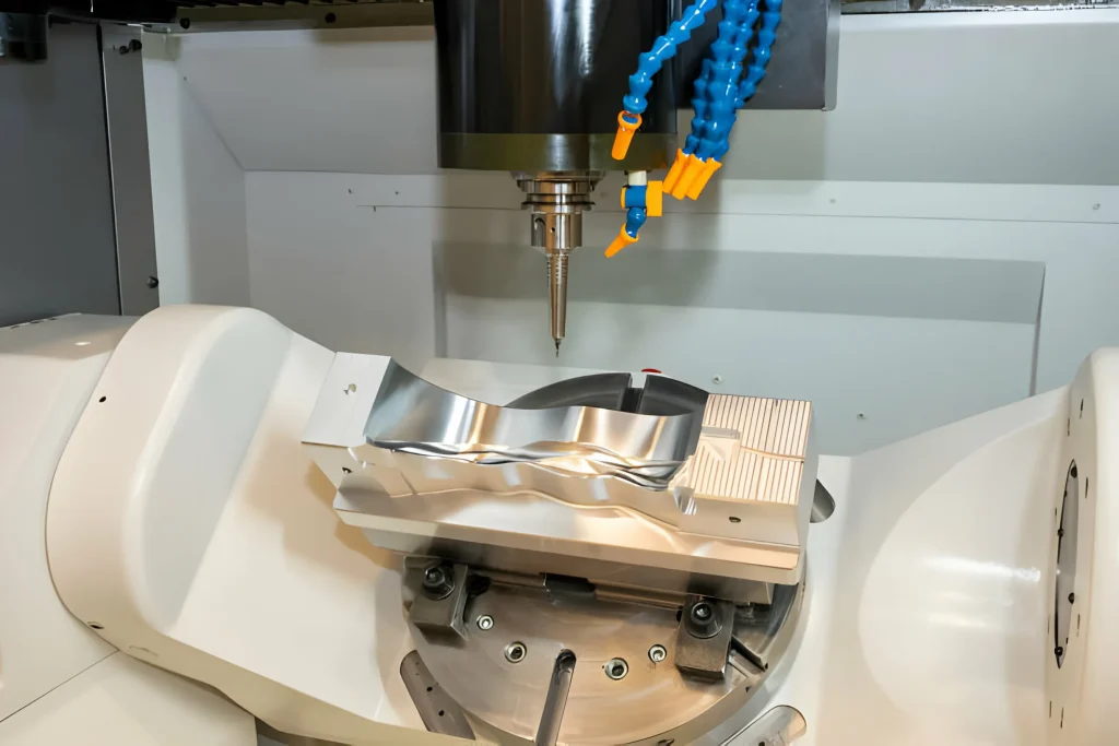 The hi-precision 5-axis machining center cutting the shoe mold parts